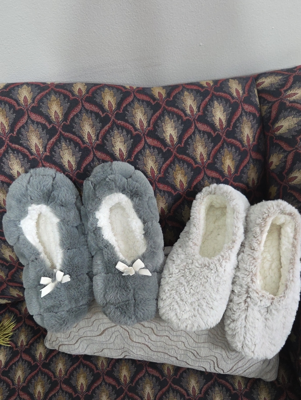 Brookstone Plush Indoor Slipper Pair in Gray and Cream.